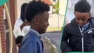 Happy kids perform AFCON dance moves, raise one leg and clap in unison