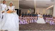 This is more than a movie: Fans in awe as Mo Bimpe steps out in royal wedding dress and 18 bridesmaids