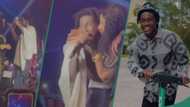 Shallipopi brings his mother on stage at his homecoming concert in Benin, she kisses his cheek