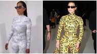 Nigerians react as lady recreates Kim Kardashian's viral yellow tape catsuit in new video