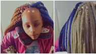 Nigerians react to trending video of lady showing off extremely tight braids