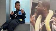 "Zion get mind pass am": Old video of Davido shaking while holding a reptile Wizkid's son played with surfaces