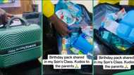 Nigerian woman displays loaded birthday box shared in her son's class, video trends online