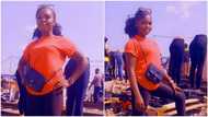 May God bless you with boutique - Reactions as Nigerian lady starts selling clothes by roadside in Lagos