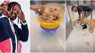 Naira Marley sparks reactions as he feeds his dogs with massive 'mountain' of piping hot chicken