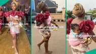 Mum who slayed to party returns barefooted with baby strapped to back: "Motherhood shege"