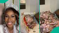 Lady who just got married shows two bags of money sprayed on her, video gets mixed reactions