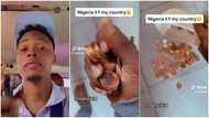 CBN deadline: Nigerian man shows N2 coins bank "paid him" in video as he withdraws N5,000