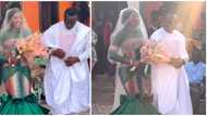 Beautiful Ghanaian bride dons kente dress for her white wedding ceremony, internet users react