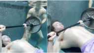Young man wows many as he lifts weight underwater effortlessly in adorable video