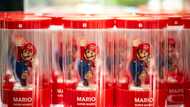 Nintendo lowers sales forecast as first-half profits plunge