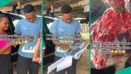 Romantic lady arrives mechanic workshop to surprise boyfriend on birthday, sprays wads of cash
