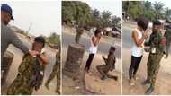 Gunshots fired as soldier pulls surprise proposal on lady at checkpoint, her reaction in the video causes stir