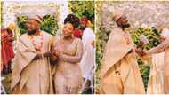 Fans congratulate Patoranking and Yemi Alade as they share traditional wedding themed photos