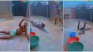 Three men slide on the floor almost naked as they have fun in the rain, video gets Nigerians talking