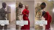 "She doesn't seem happy": US soldier flies into Nigeria to surprise fiance at her birthday shoot, causes stir
