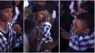 Wizkid attends Asake's show, stands without bouncers as he allows fans snap pictures with him in video