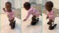 Little girl leaves everyone in awe as she slays mum's oversized heels, walks perfectly in video