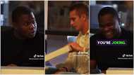 "Give me $5": Oyinbo pranks Nigerian man, gives him new Mac laptop, tells him to pay in bits