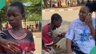 "I hope he goes to school too": Video shows moment boy signed graduating student's shirt