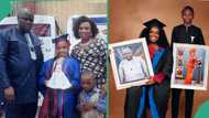 University graduate frames photos of her late parents who died before her graduation day