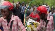 Drama as bike man cries with baby's voice on the road, people gather to watch him