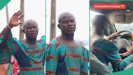 Ibadan Micra driver wears his wife's gown to work, passengers watch him with surprise