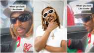“Na Alake be this”: Fans gather round singer Asake’s lookalike, beg him to settle them in video, he laments
