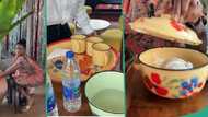 Lagos food seller designs restaurant to look like one from the 1990s, uses beautiful enamel set