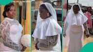 Man shares video showing what his wife was given to wear on her wedding gown by church