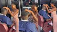 Creative female barber blessed with beauty gives man perfect haircut in her shop, video emerges on TikTok