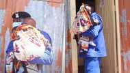 Kind police officer helps candidate to take care of her baby while she sits for exam; his gesture warms hearts