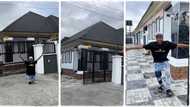 Nigerian man kneels, celebrates endlessly as he completes his new house, video goes viral