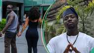 Verydarkman and Oyibo mystery woman kiss on TikTok live, fans catch glimpse of her face: “She fine o”