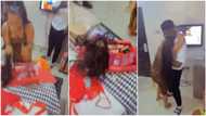 Lady almost runs 'mad', screams for joy as lover gives her bone straight hair, Nigerians react (see video)