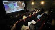 Ukraine's reopening cinemas offer refuge from reality -- and air raids