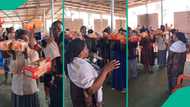 Prophetess shares video of church members holding loaves of bread and cans of sardines