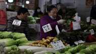 Asian markets mixed ahead of US inflation data, Fed decision