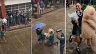 “This Girl Too Fine”: Secondary School Boy Proposes to Pretty Girl in Front of Entire School With Teddy Bear