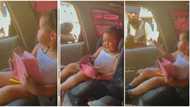 Kindness has no age: Cute baby girl opens handbag, removes cash, gives to beggar through car window in video