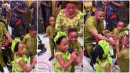 Yinka Ayefele looks on proudly as triplets seize microphone from musician and start singing at birthday party