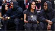 So proud: Kanye West's Kim Kardashian lookalike lover congratulates him on Grammy wins