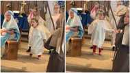 Kid wearing angel costume dances with energy during hymn presentation in Catholic church, video goes viral