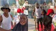 Hilarious moment Ighalo joked about letting go of mother after she photobombed him in his Lekki mansion