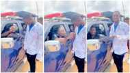 Amazing moment Nigerian police officer signs on a graduating student's shirt, video stirs reactions
