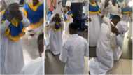Everybody just dey propose: Man drops to his knees, gives girlfriend ring in church, romantic video goes viral