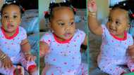 "She is cute": Beautiful baby dances to her favourite song while sitting down, video melts hearts