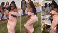 Video of beautiful bridesmaid in gown dancing without caring who's looking gets people talking