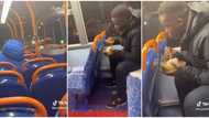 "Someone's husband abroad": Man eats swallow and soup with bare hands in UK bus, video trends on TikTok
