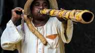 Sudan traditional wind instrument trumpets harvest time
